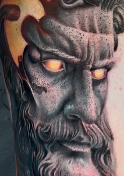 Statue realism tattoo by Devin Clausen