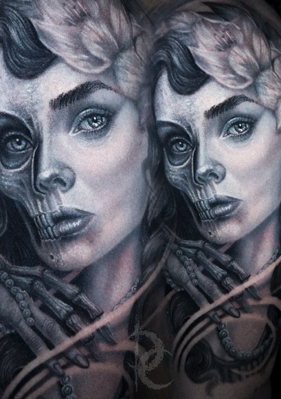 Black and grey portrait tattoo